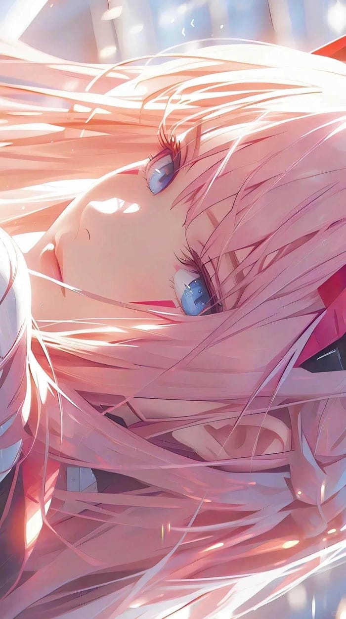 Anime girl tóc hồng phong thái dễ